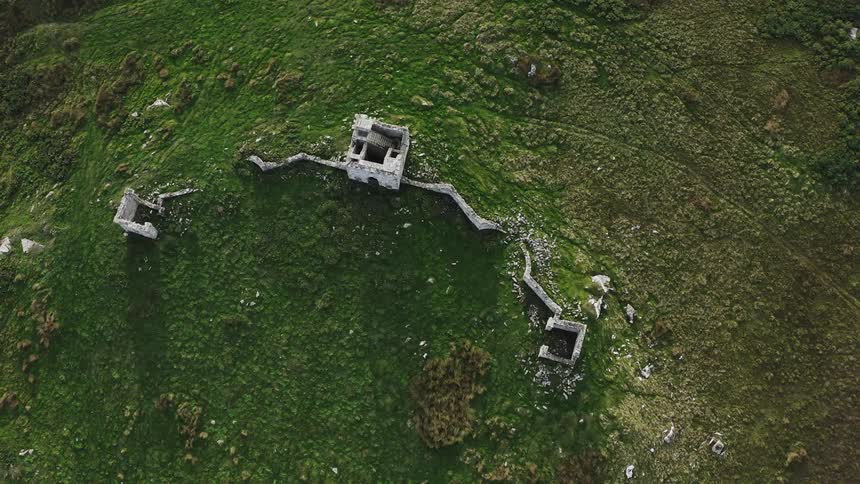 Top view of forts and buildings amid hills in the mountains