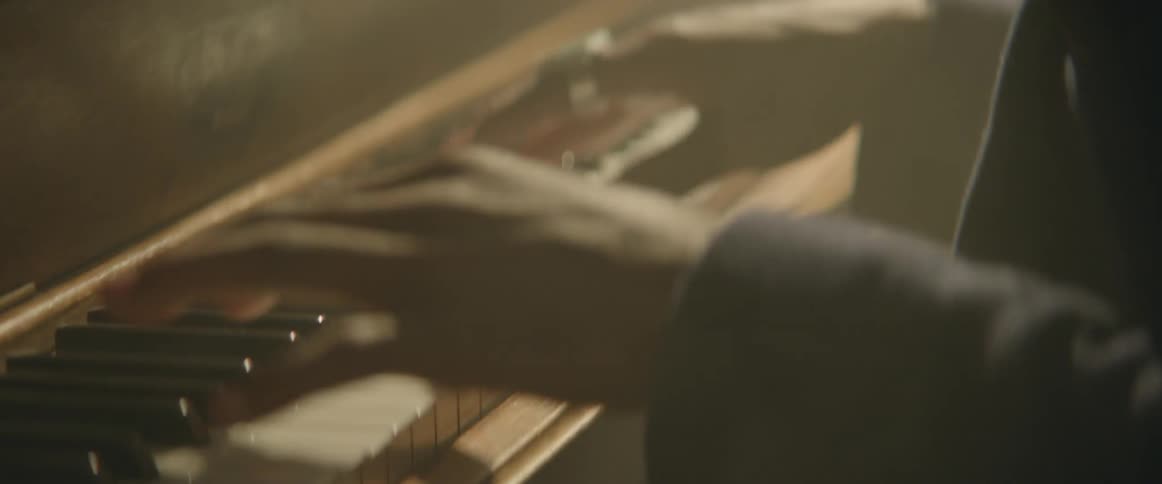 A man playing a piano
