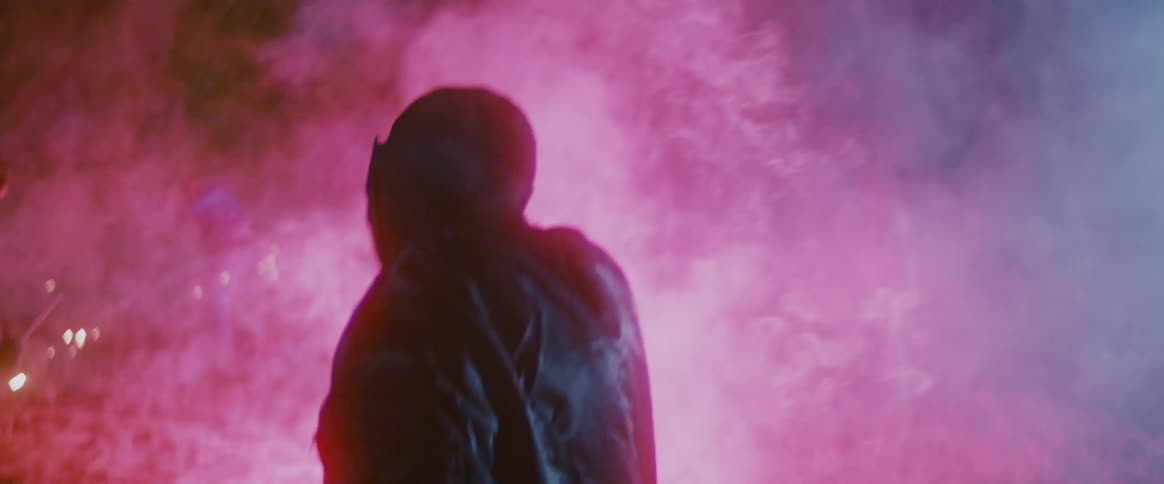 Shots of flares being fired in a camp