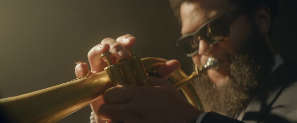 A trumpeter plays his instrument