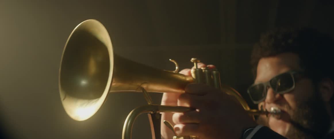 A trumpeter plays his instrument