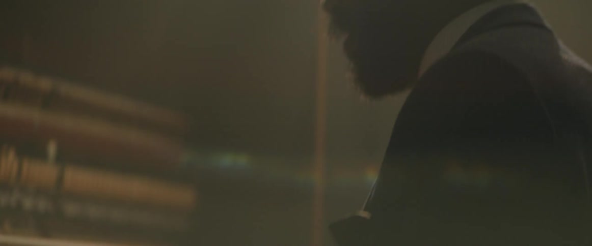 A man is energetically playing the piano