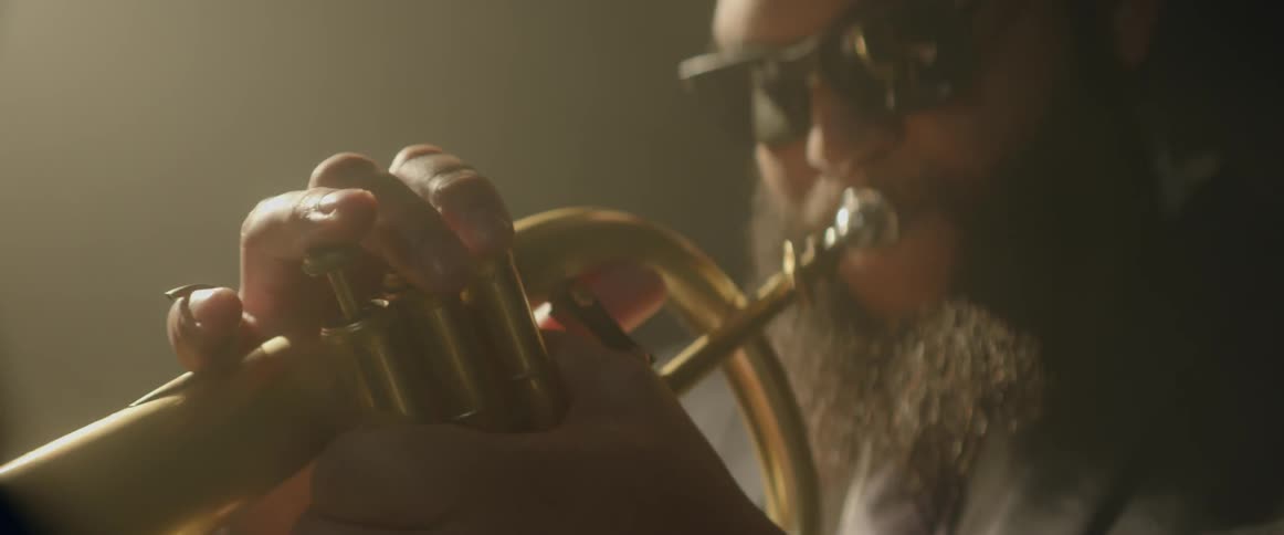 A trumpeter plays his instrument