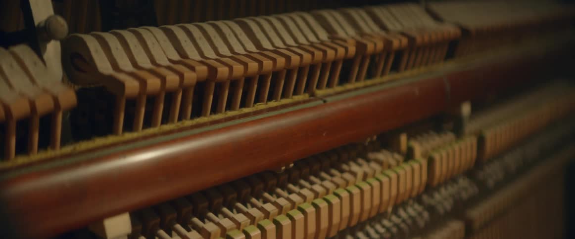 The inside of a piano while it's being played
