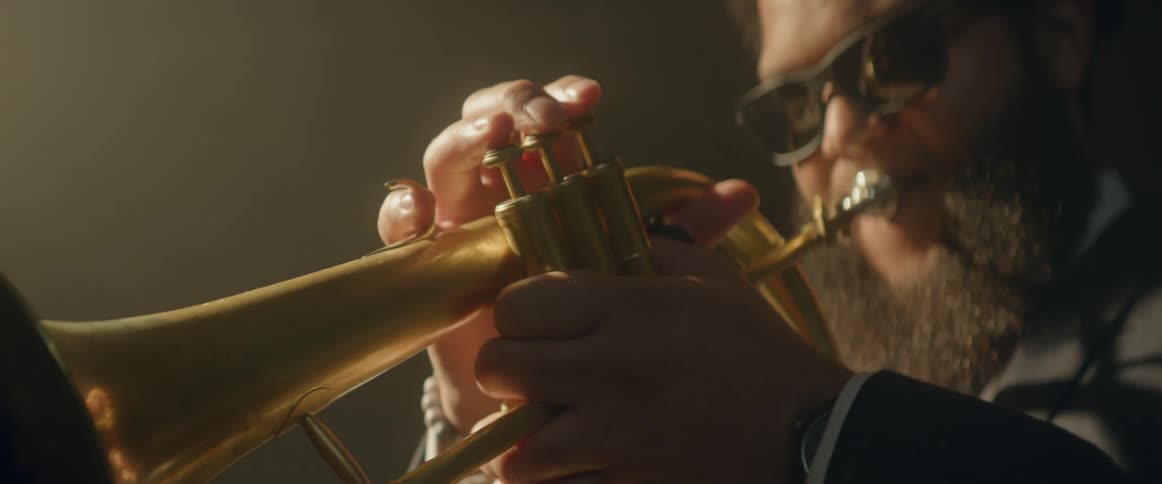 A trumpeter plays his instrument
