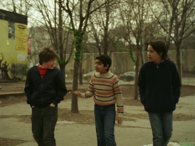 Three friends playing in the park