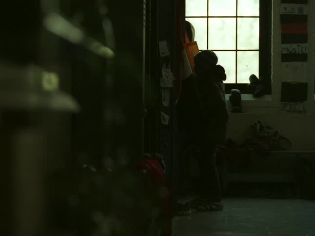 Child puts on winter gear and runs from the room