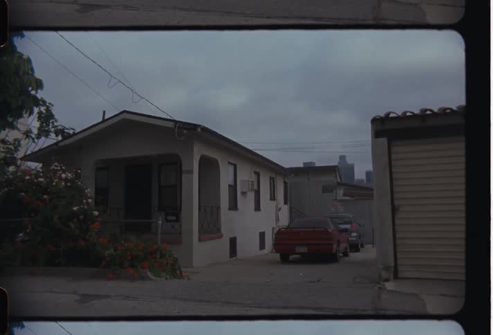 Cars parked on the garage of a house in the neighborhood