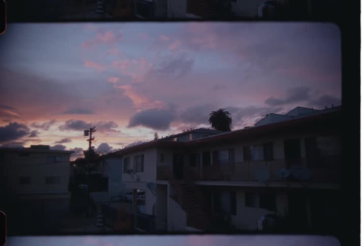 Residential area in the city at sunset caught on vintage film