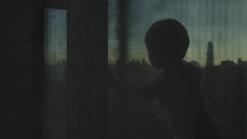 Girl looking at central park in new york city at sunset