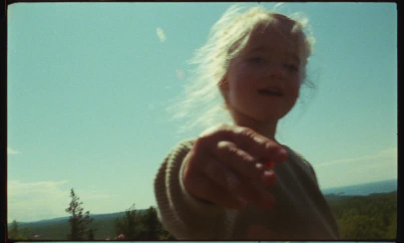 Child having fun in the countryside on a sunny day