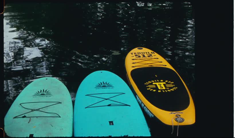 Paddleboards in the middle of a lake