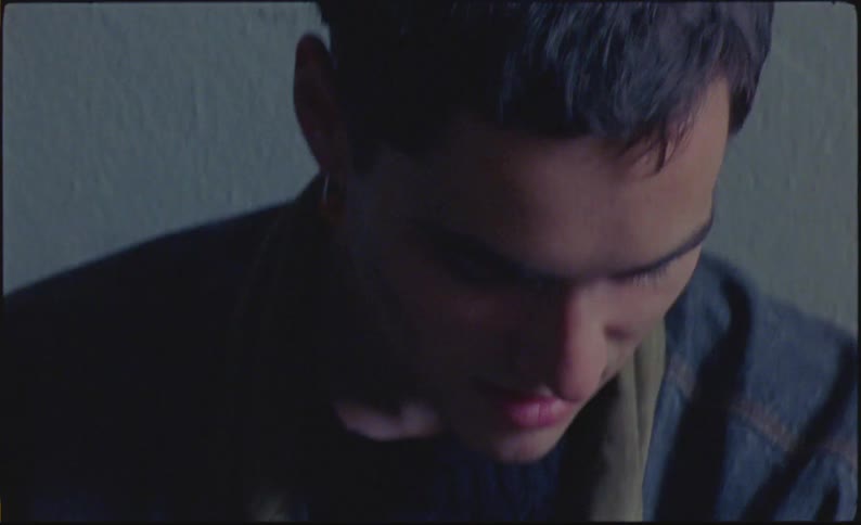 A man has his mouth open in surprise then lowers his head pondering