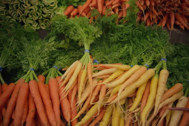 A large quantity of carrots on display for sale