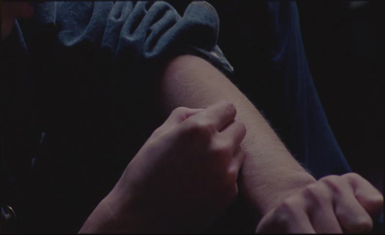 A person writing on their skin