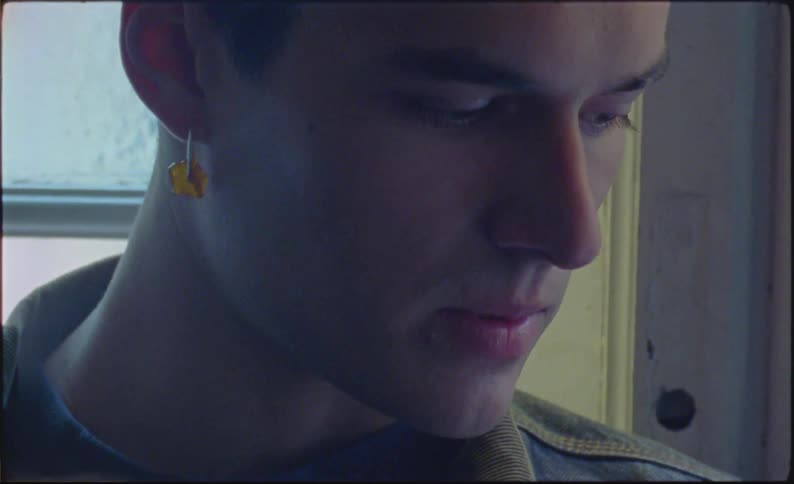 A man is murmuring, daydreaming.