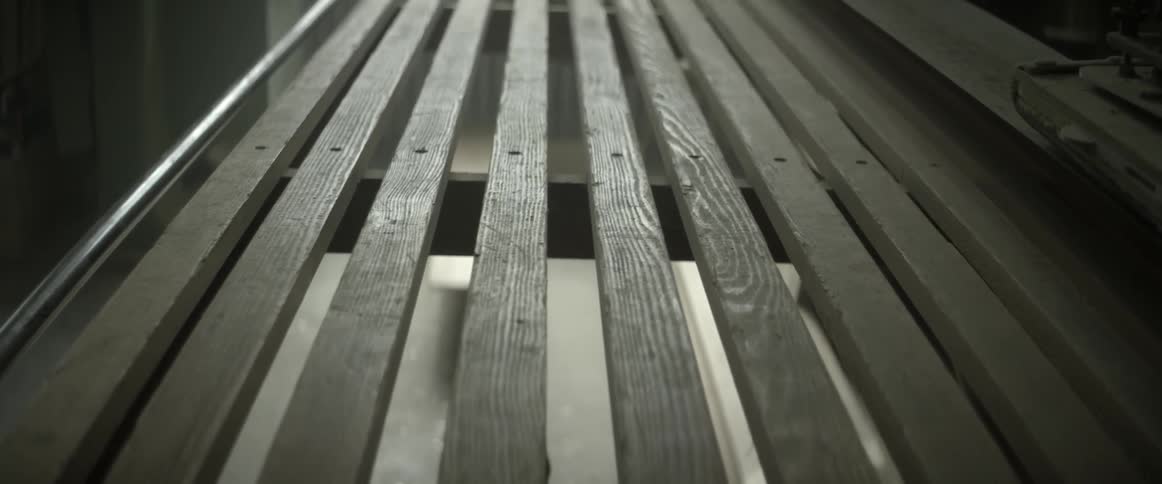 Boards forming a walkway inside a building