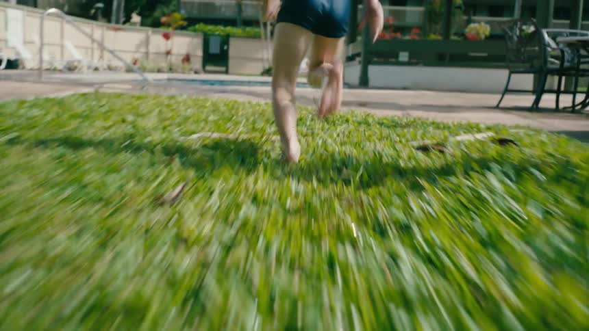 Excited kids dashing into the pool