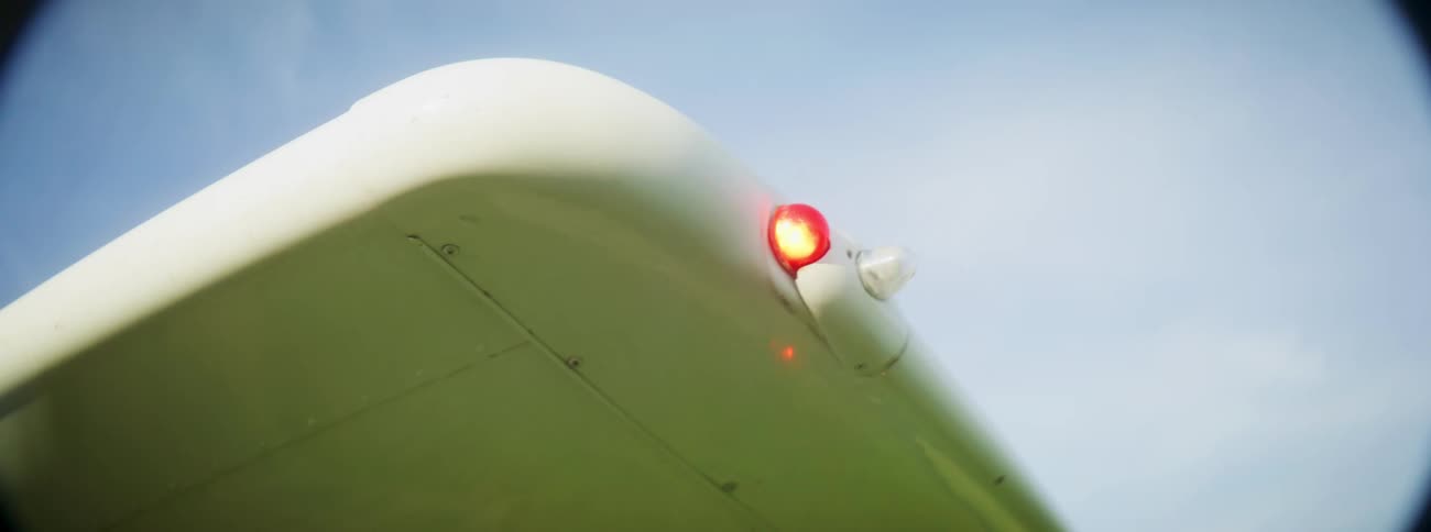 The light on the plane wing is blinking