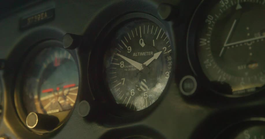 Close up of the gauges on the dashboard of an airplane