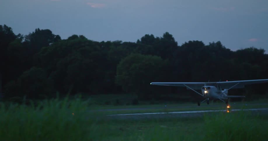 A plane lands on the runway