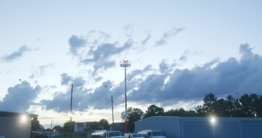 Clouds in a calm evening sky over a town