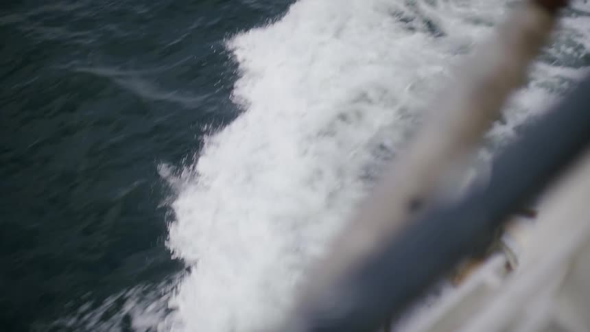 A clip of sea waves cased by a moving boat