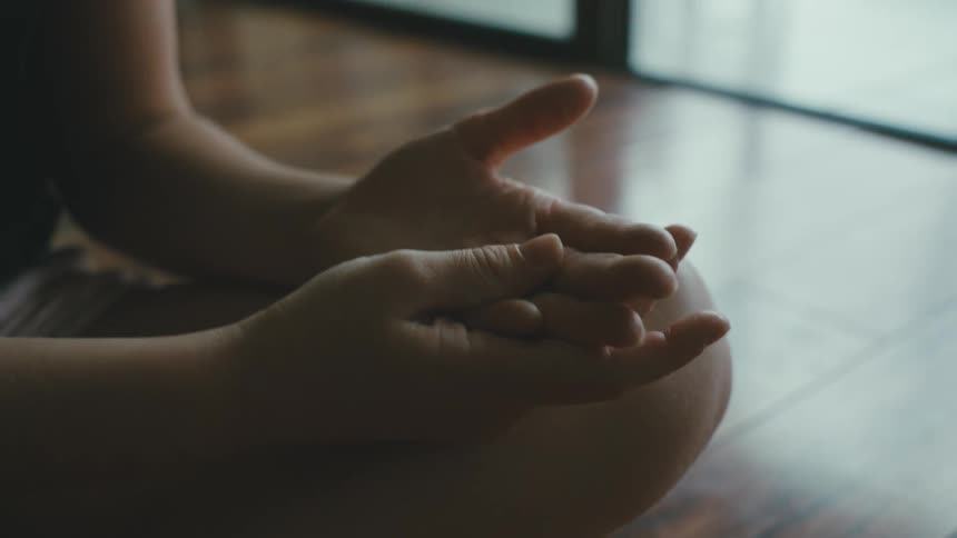 A clip of a person folding fingers