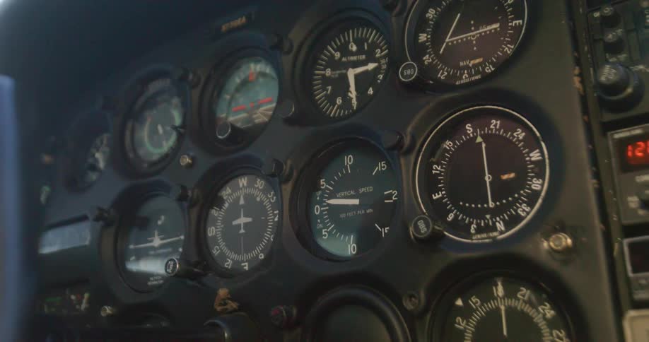 Airplane cabin dashboard with many displays and measurement tools