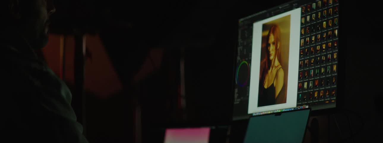A clip of a person operating a computer in the studio