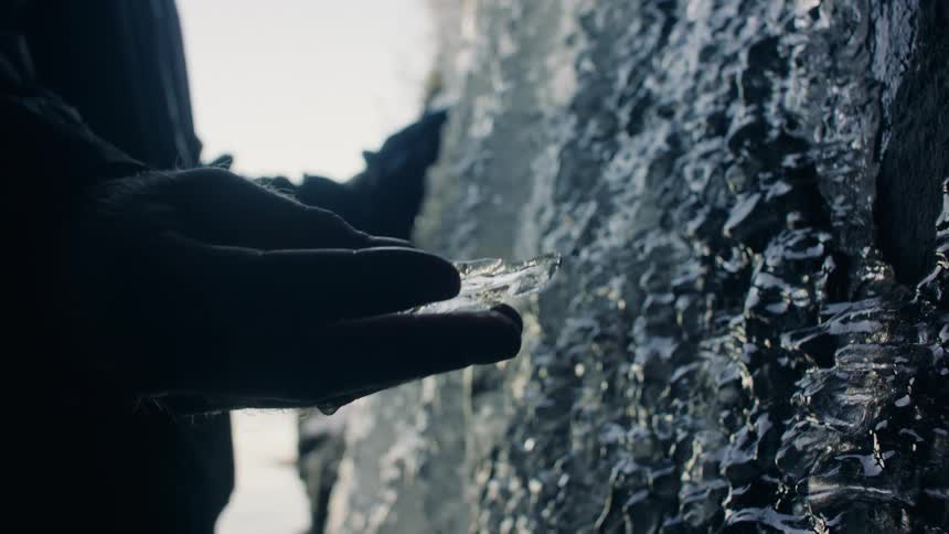 A clip of a person holding an ice
