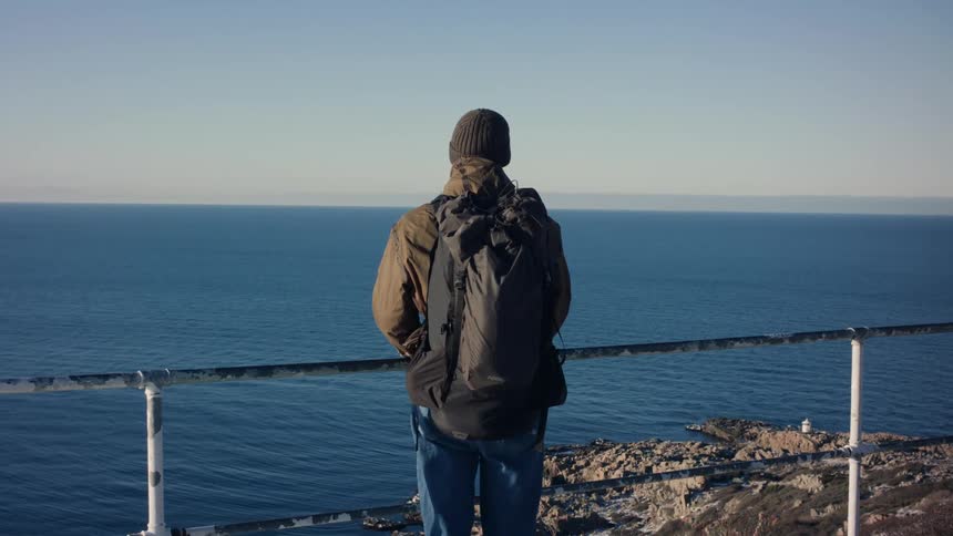 A clip of a person sightseeing the sea