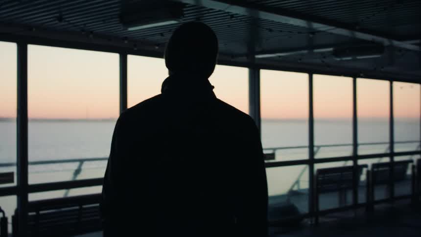 A clip of a man walking in a building