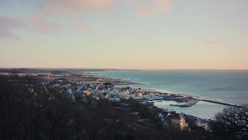 An aerial view of a city closer to the sea