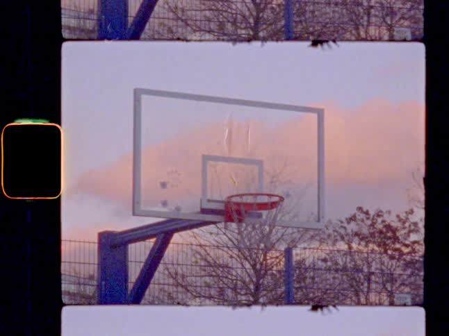 A made basketball shot in front of a beautiful sky