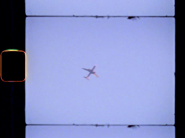 Airplane flying in the blue sky