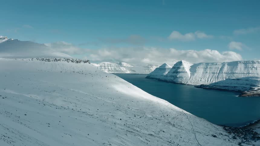 Arctic area with ice cold sea during sunny day