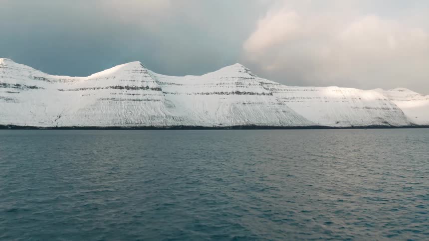 A revealing clip of an ice mountain shore in the arctic