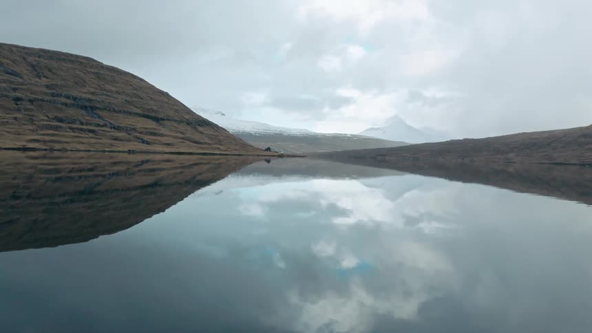 Aerial view over the surface of a lake