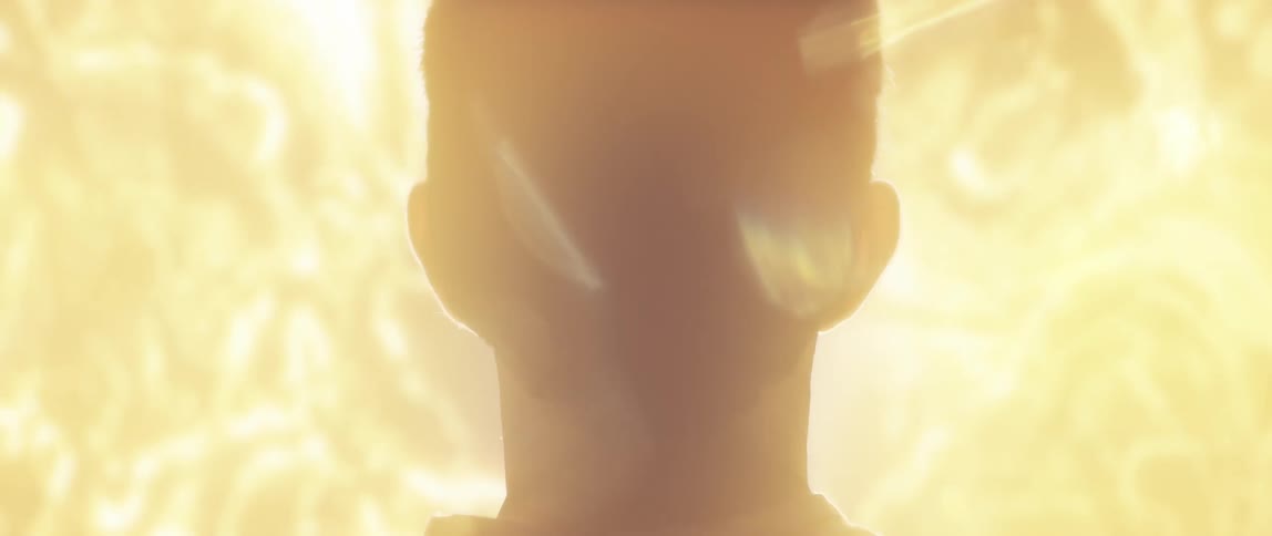 The bright lights shine on the man