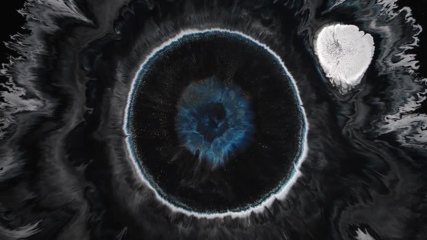 Fluid art of a blue nebula glowing in space