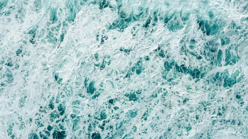 Top view of foamy ocean waves