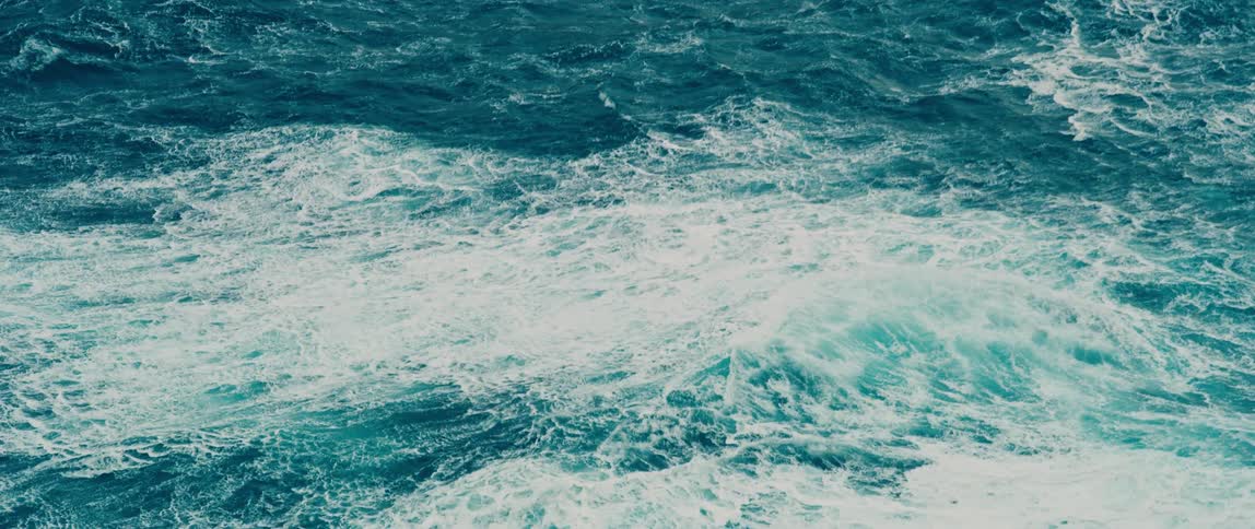 Waves of a rough sea during a sunny day