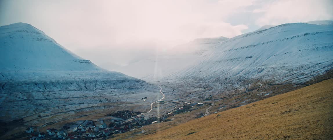 Small rural town on a valley in the mountains
