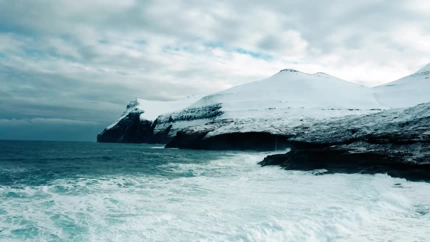 A clip of an ice mountain at the sea shore