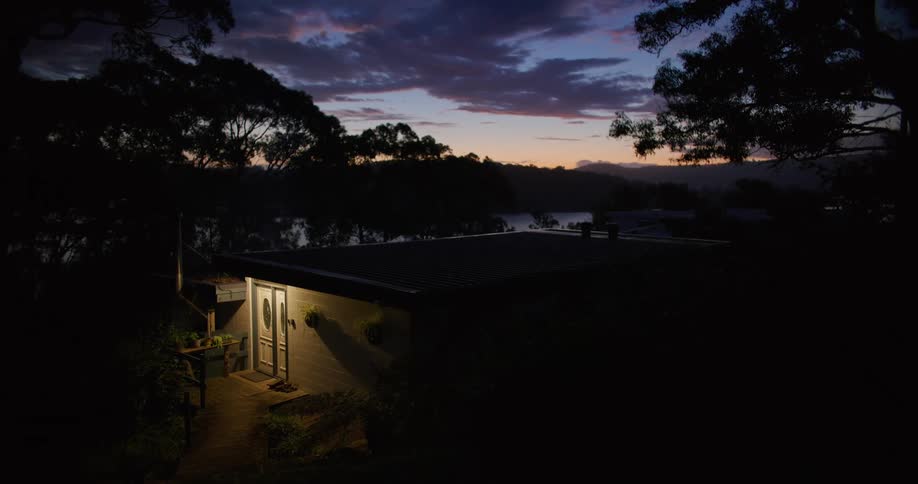 Small rural house in the countryside at evening