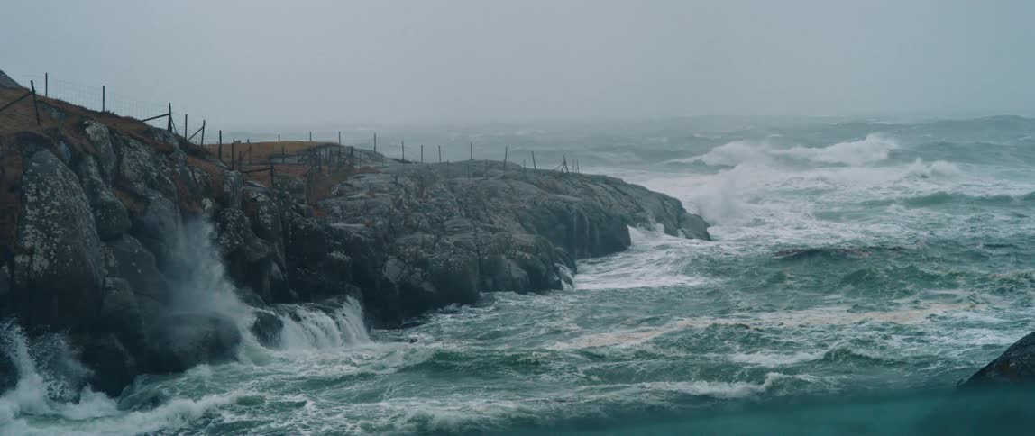 Panorama of the strong waves crashing on the seashore