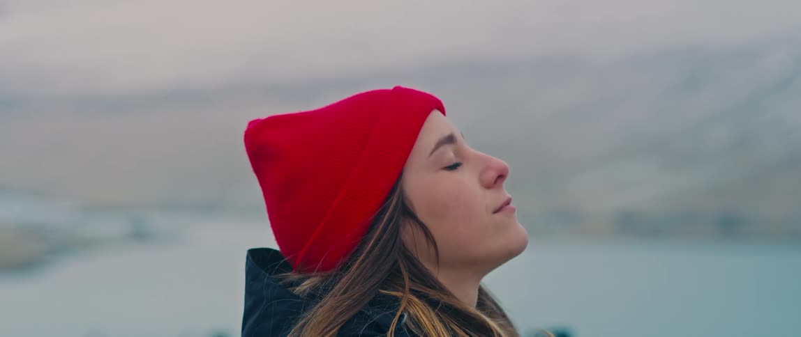A woman inspired by the Faroe Islands landscape