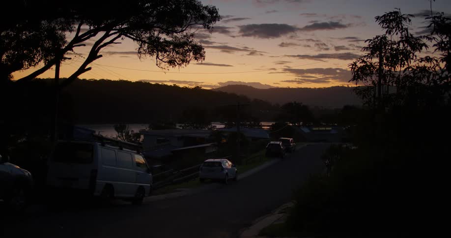 Cars are parked on the road