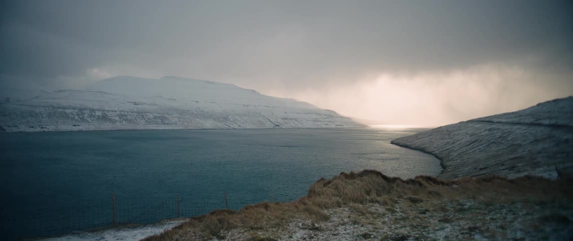 A road on the edge of a hill on the sea coast during winter